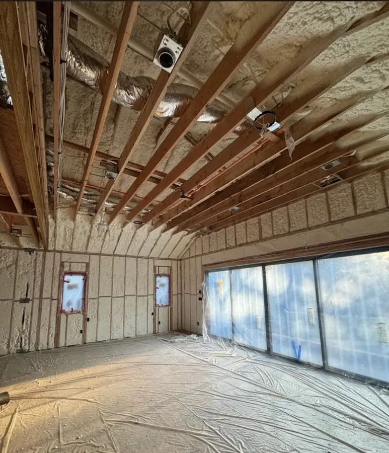Interior walls and ceiling insulated with spray foam during new construction in Ambler